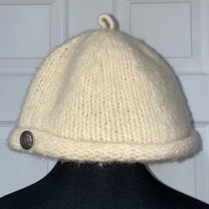 Handmade wool hat in cream with 1936 nickel button